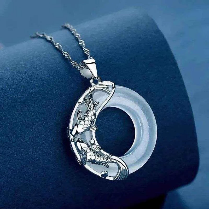 Lucky Koi Cat’s Eye Silver Pendant