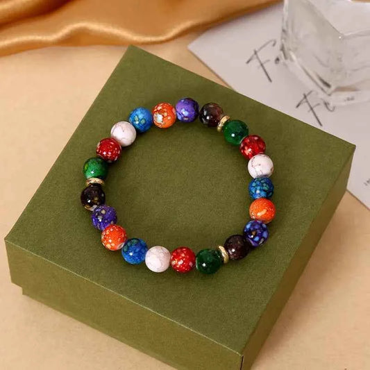 Rainbow Acrylic Beaded Bracelet with Planet and Star Design
